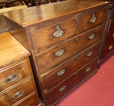 Lot 1359 - A circa 1800 provincial oak square front chest...