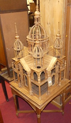 Lot 1368 - A carved hardwood freestanding birdcage, in...