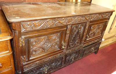 Lot 1374 - An antique joined and floral relief carved and...