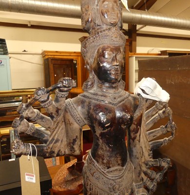 Lot 1389 - An Indonesian painted terracotta standing...