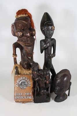 Lot 665 - A collection of tribal art, to include an...