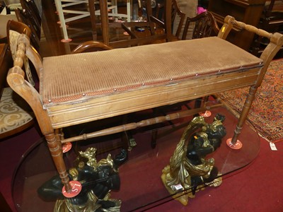 Lot 1400 - An Edwardian beech hinged top twin music stool,...