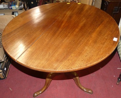Lot 1416 - A George III mahogany circular tilt-top...