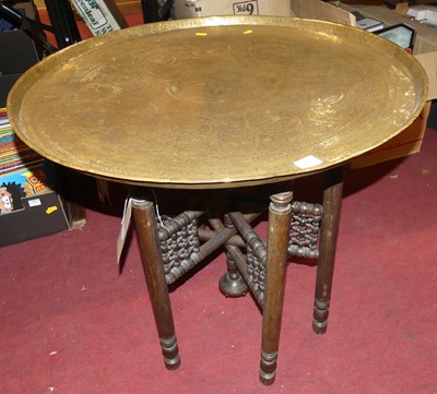 Lot 1418 - An early 20th century engraved brass top...