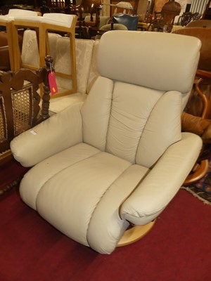Lot 1426 - A contemporary Stressless formed laminate,...