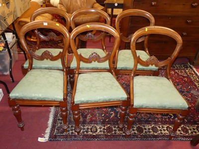 Lot 1427 - A set of six mid-Victorian mahogany balloon...