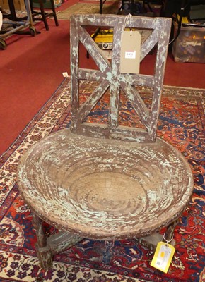 Lot 1431 - An African tribal painted hardwood side chair,...