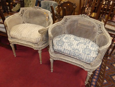 Lot 1455 - A pair of French grey painted and cane inset...
