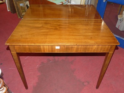 Lot 1462 - A 19th century mahogany fold-over tea table,...