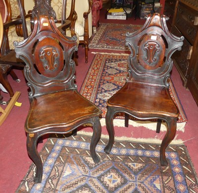 Lot 1463 - A pair of mid-Victorian mahogany pierced and...
