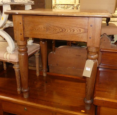 Lot 1466 - A pitch pine compact kitchen side table on...