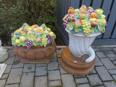 Lot 1496 - Two decorative terracotta and glazed...