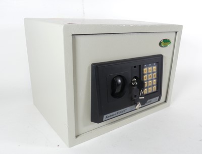 Lot 440 - A Kamasa steel safe, w.35cm