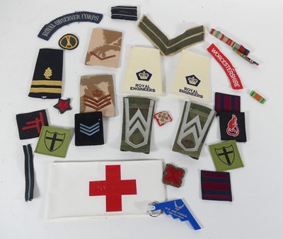 Lot 443 - A collection of military cloth badges, to...