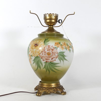 Lot 112 - An iridescent glass lamp, of globular form and...