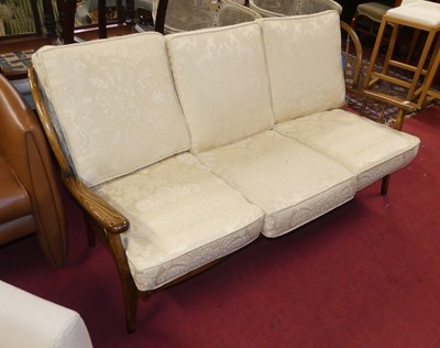 Lot 1458 - An Ercol style stained beech settee, with...