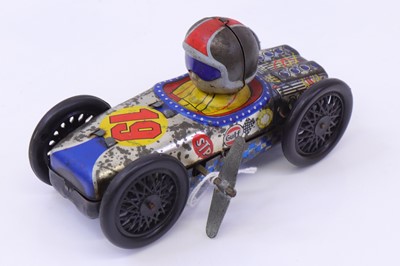 Lot 1730 - Yonezawa tinplate and clockwork model of a...