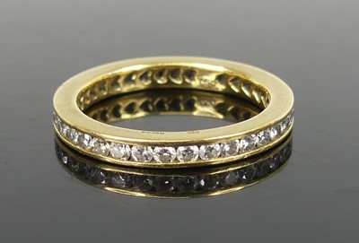Lot 2517 - A yellow metal diamond eternity ring...