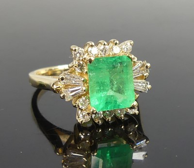 Lot 2542 - A yellow metal emerald and diamond rectangular...