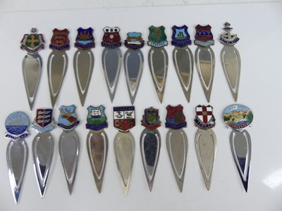 Lot A collection of white metal souvenir clip...