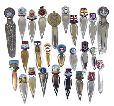 Lot A collection of metal and EPNS souvenir clip...