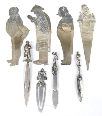 Lot Four white metal novelty figural bookmarks,...