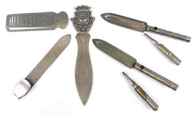 Lot Three silver clip bookmarks, comprising a...