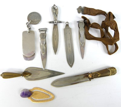 Lot Five early 20th century silver clip bookmarks,...