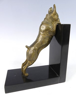 Lot 82 - An Art Deco bronze and black slate single book-...