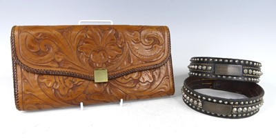 Lot 94 - A vintage embossed tan leather clutch bag, the...