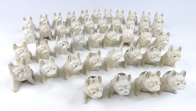 Lot 44 - A collection of various crested china seated...