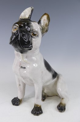 Lot 17 - A large glazed earthenware model of a seated...