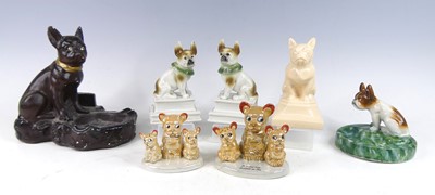 Lot 37 - A pair of Art Deco glazed ceramic book-ends,...