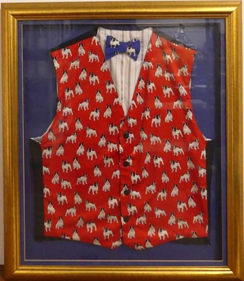 Lot 109 - A framed silk waistcoat and bow-tie, decorated...