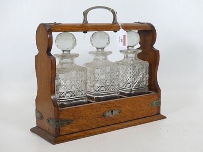 Lot 90 - An early 20th century oak metal mounted...