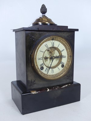 Lot 104 - A 19th century black slate mantel clock, the...