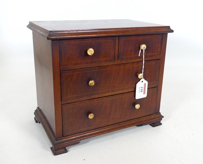 Lot 118 - A 19th century figured mahogany apprentice...