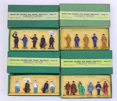 Lot 179 - Four Dinky Toys 0 gauge railway figure packs...