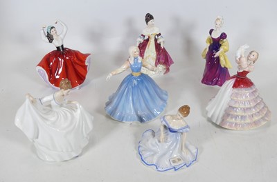 Lot 149 - A collection of Royal Doulton figures of...