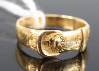 Lot 321 - An 18ct gold belt ring, sponsor JG, size M, 4g