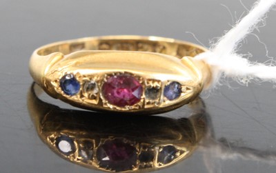Lot 324 - A circa 1900 18ct gold, ruby, sapphire and...