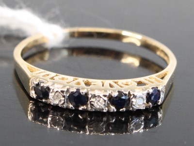 Lot 326 - A 9ct gold sapphire and diamond point set half-...