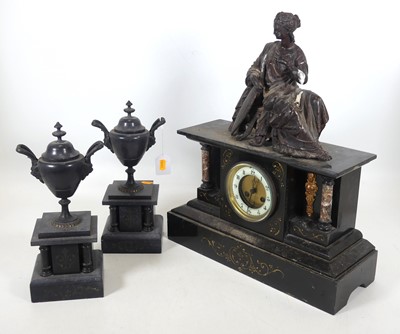 Lot 173 - A late 19th century black slate mantel clock,...