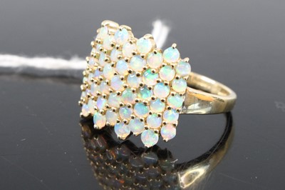 Lot 344 - A modern 9ct gold multi-opal set tablet ring,...