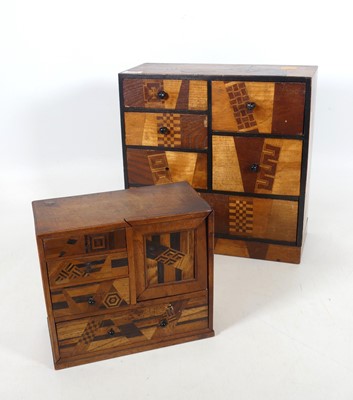 Lot 178 - A Japanese specimen marquetry table cabinet,...