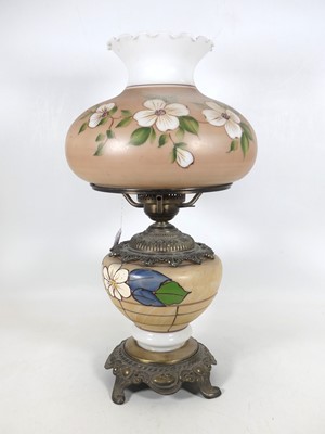 Lot 183 - A mid 20th century table lamp, in the form of...