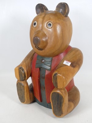 Lot 189 - A carved and stained hardwood figure of a...