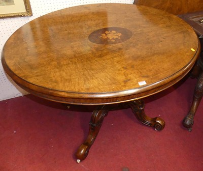 Lot 1176 - Two mid-Victorian figured walnut oval tilt-top...