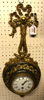 Lot 1191 - A French gilt bronze cartel clock, having...