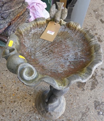 Lot 1200 - A lead garden bird-bath, the scroll shell...